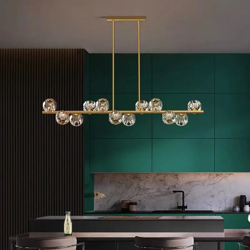 Gold-toned decorbites crystal chandelier pendant light with clear faceted glass globes for living and dining room decor