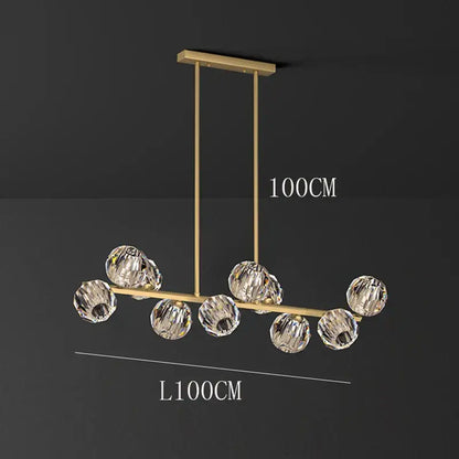 Gold-toned decorbites crystal chandelier pendant light with seven faceted crystal spheres for living and dining room luxury decor