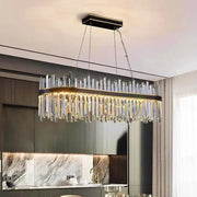Elegant decorbites crystal chandelier pendant light with black metal frame and cascading clear crystal prisms for indoor use