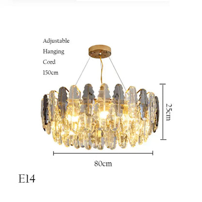 A decorbites crystal chandelier pendant light with gold mount and cascading clear and dark gray crystals for living room