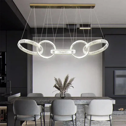 DecorBites crystal chandelier pendant light with gold-toned ceiling mount and interlocking rings for living room lighting