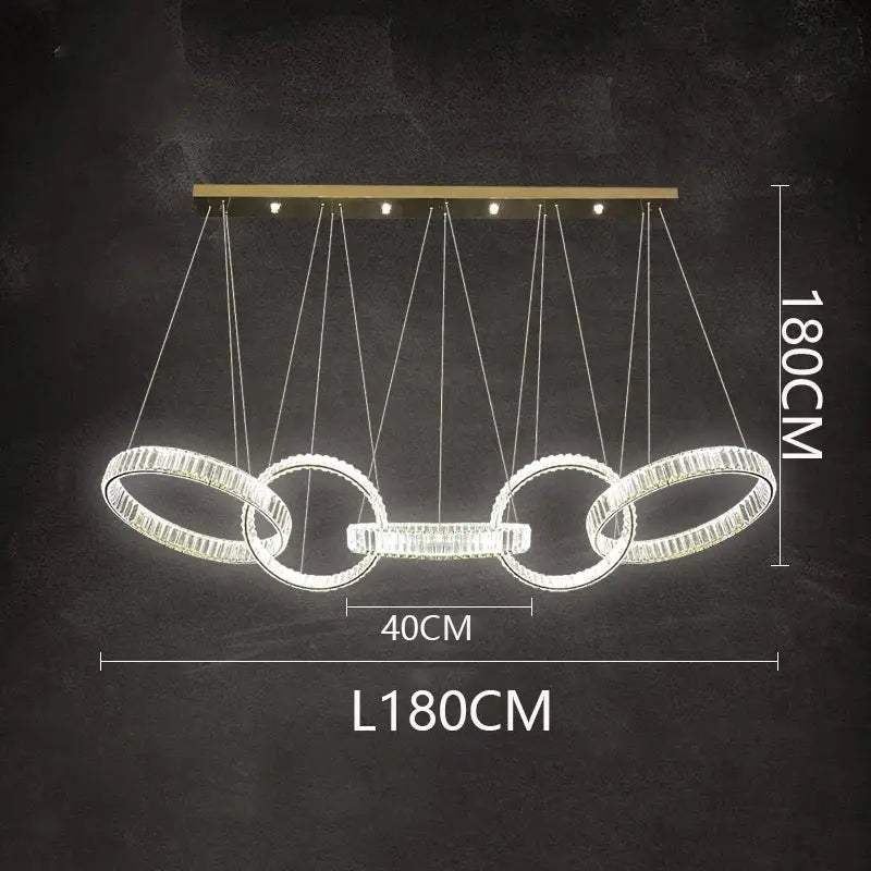 Modern DecorBites crystal chandelier pendant light with four crystal-encrusted rings and gold-toned bar for living room lighting