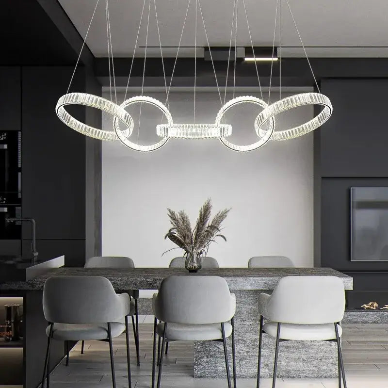 Modern decorbites crystal chandelier pendant light with interlocking rings and minimalist design for living room lighting