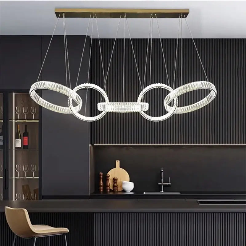 Modern DecorBites crystal chandelier pendant light with interlocking rings and brass bar for living room ceiling lighting