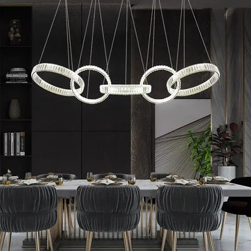 Modern crystal-encrusted DecorBites crystal chandelier pendant light with interlocking circles for living room ceiling lighting