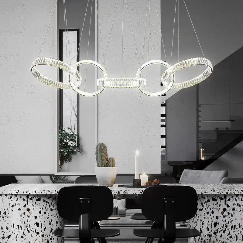 Modern crystal chandelier pendant light by decorbites featuring interconnected circular elements for living room lighting