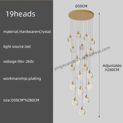 A modern DecorBites crystal chandelier pendant light with 19 clear crystal spheres and adjustable gold-toned base