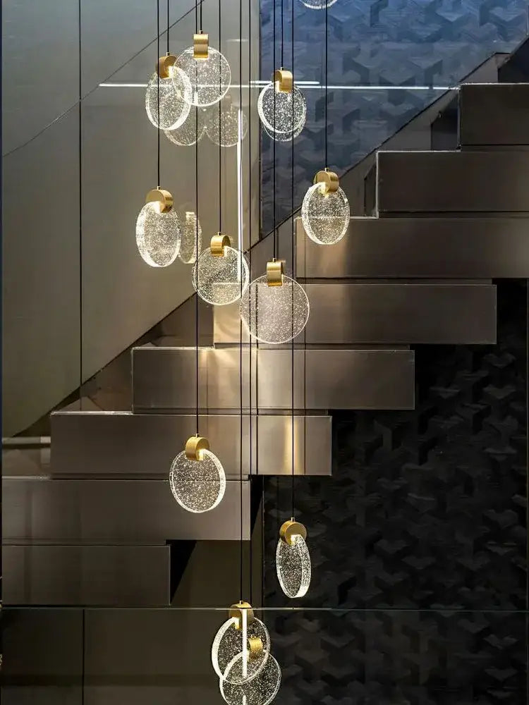 Modern decorbites crystal chandelier pendant light with clear textured glass orbs and gold metal for luxury staircase