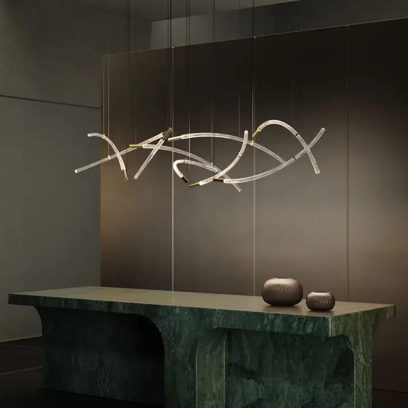 Modern abstract decorbites crystal chandelier pendant light with clear curved glass rods and gold metal joints suspended