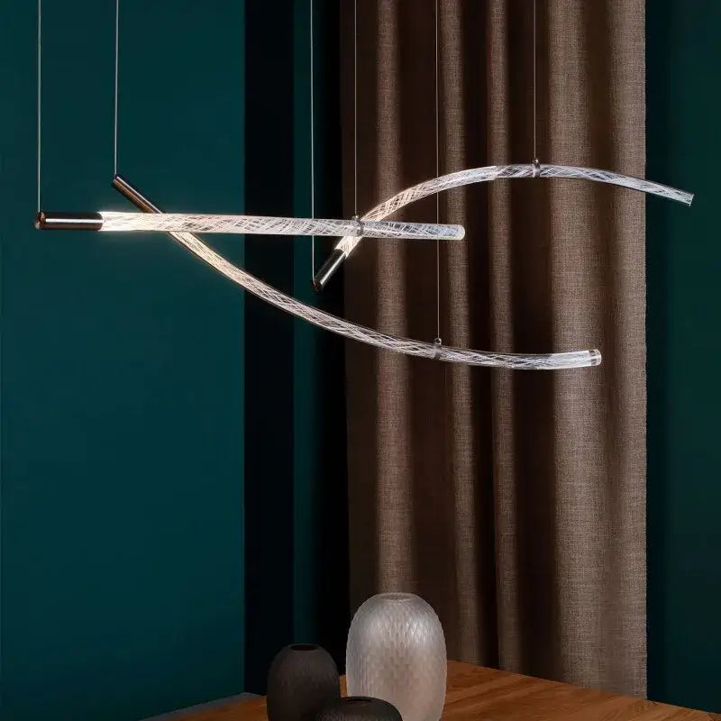 Modern minimalist pendant light with curved glass arms and brushed brass accent in decorbites crystal chandelier pendant