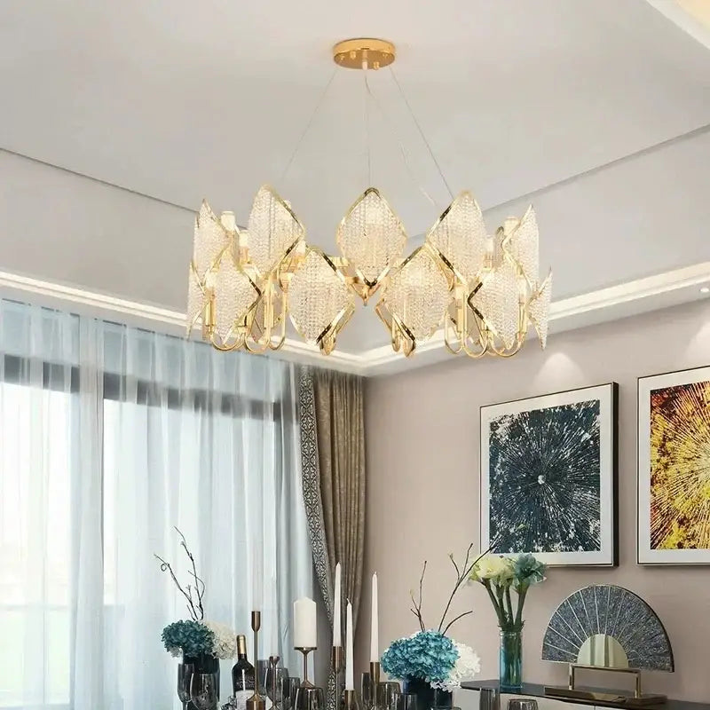 Gold-toned decorbites crystal chandelier pendant light with diamond-shaped crystal panels and modern geometric design