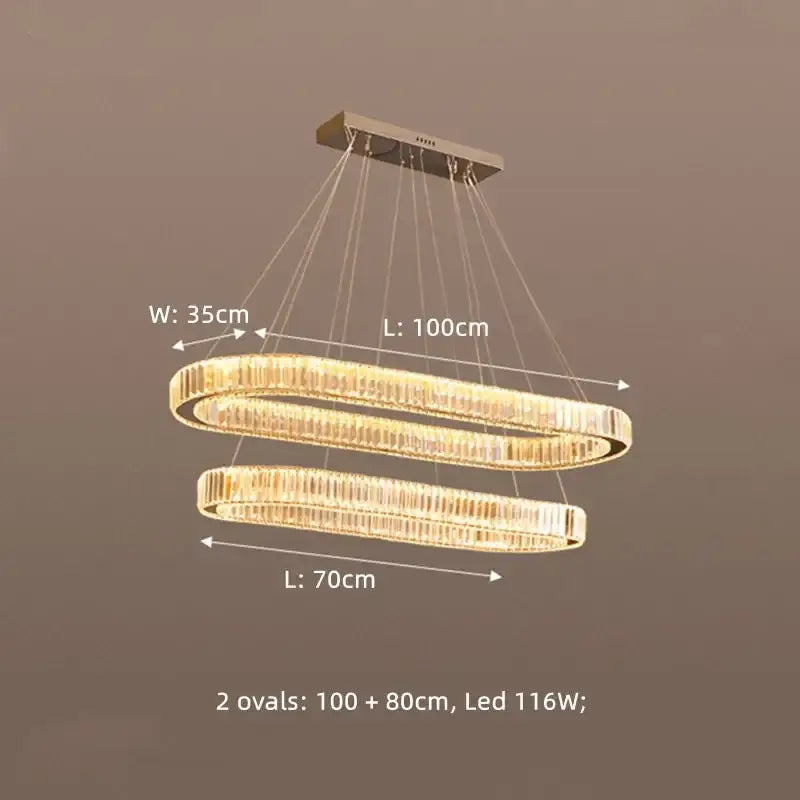 Modern double-oval decorbites crystal chandelier pendant lights with gold-toned metal frame and clear crystal accents