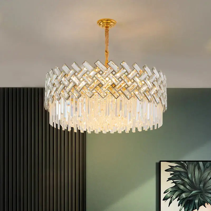 A gold-toned decorbites crystal chandelier pendant light with woven clear crystal bars and cascading prisms for home decor