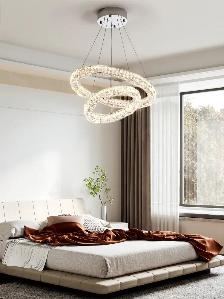 Decorbites crystal chandelier ring with intertwined crystal rings and sleek chrome finish for elegant living spaces