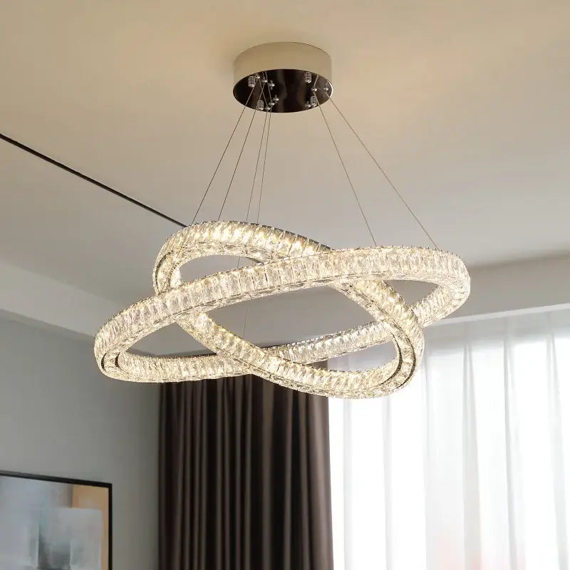 Decorbites crystal chandelier ring with interlocking rings chrome finish and warm led lights for elegant living spaces