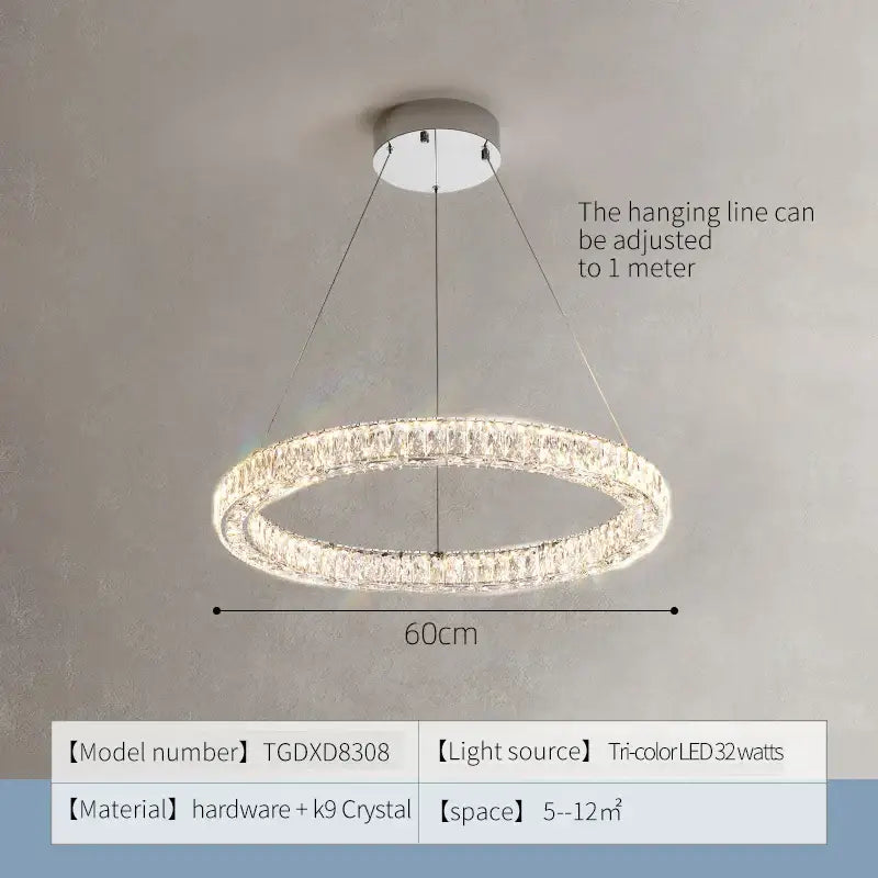 A modern decorbites crystal chandelier ring with metallic base clear k9 crystals and tri-color led lights for living spaces