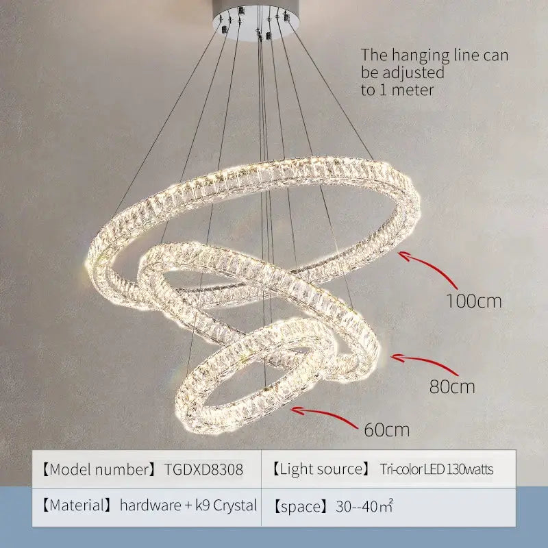 A decorbites crystal chandelier featuring multi-tiered interlocking crystal rings with a sleek metallic finish