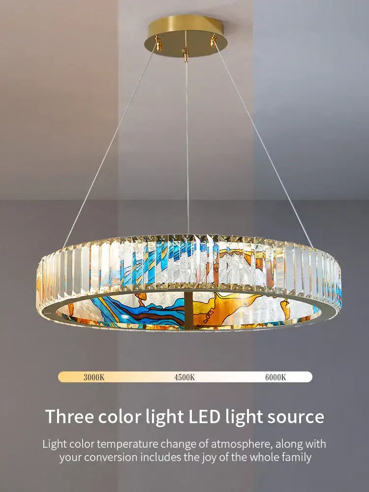 DecorBites crystal chandelier ring light with gold mount clear crystal prisms and blue orange stained glass panels