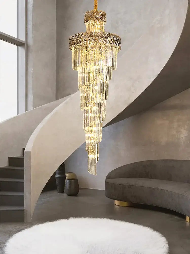 Golden decorbites crystal chandelier with cascading crystal tiers in a sleek modern design for luxury lighting