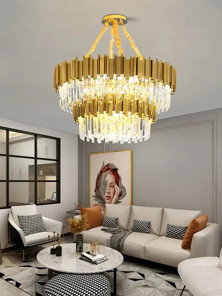 Luxurious decorbites crystal chandelier with cascading clear glass prisms in polished gold stainless steel frame