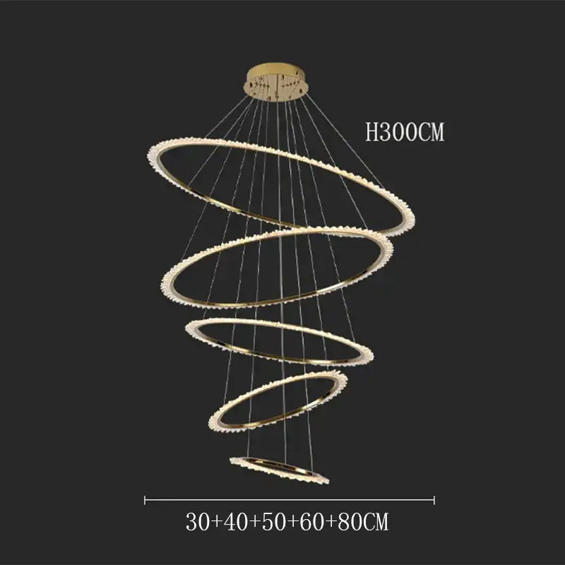 Gold-toned decorbites crystal chandelier with five concentric rings and embedded crystals for modern home lighting