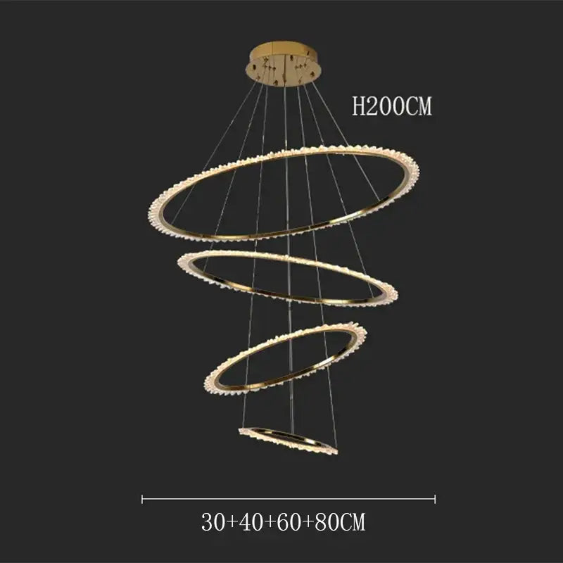 Gold-toned decorbites crystal chandelier with three concentric rings and crystal accents for modern living room lighting