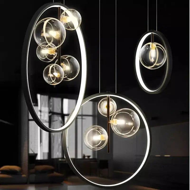 Modern black oval pendant light with glowing circular frames and clear glass spheres for decorbites crystal chandelier stair lighting