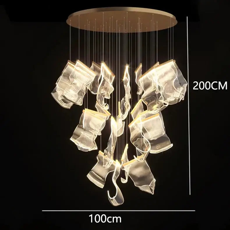 A modern 200cm tall decorbites crystal chandelier with a gold base and glowing acrylic pieces for living room lighting