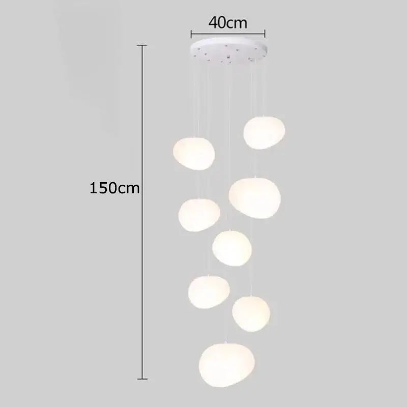 A modern white decorbites crystal chandelier pendant lamp with seven frosted glass globe lights for stair lighting