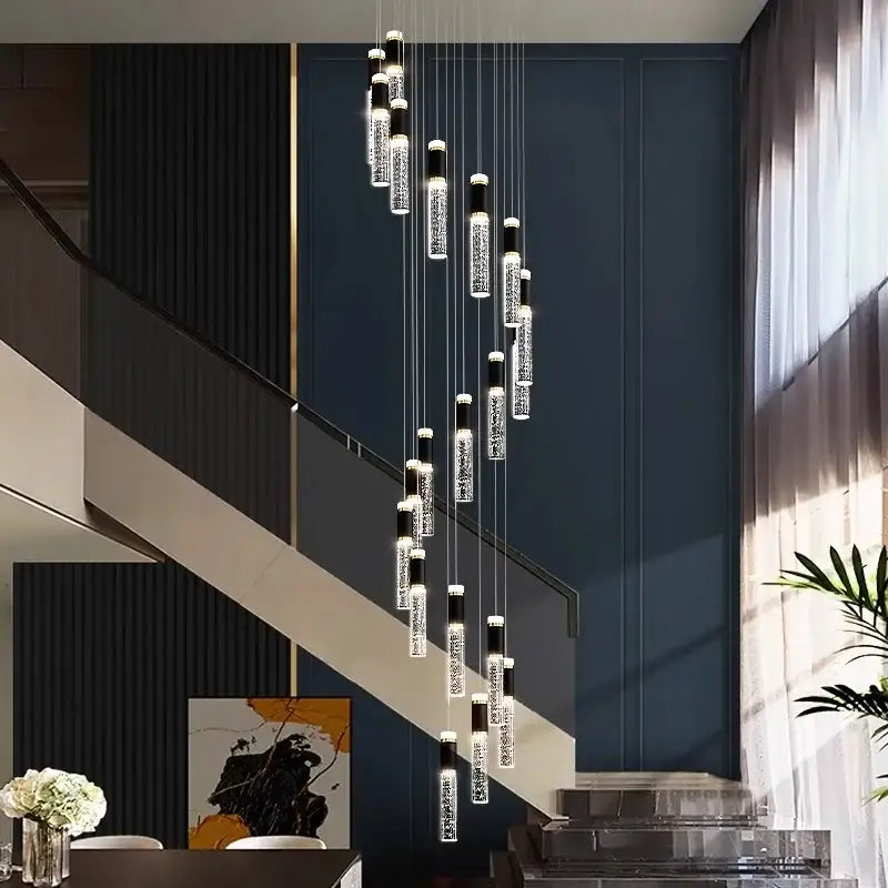 Modern decorbites crystal chandelier with clear crystal-encrusted pendants and black accents for stair pendant lighting