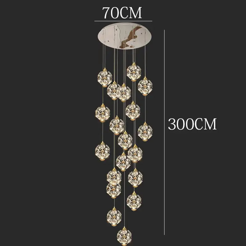 A decorbites crystal chandelier pendant lamp with gold chains and clear glass spheres for stair or living room lighting