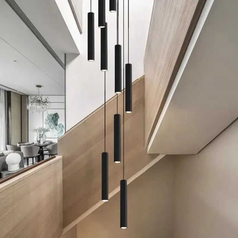 Black cylindrical pendant lights form a modern minimalist decorbites crystal chandelier stair pendant lamp for living room lighting
