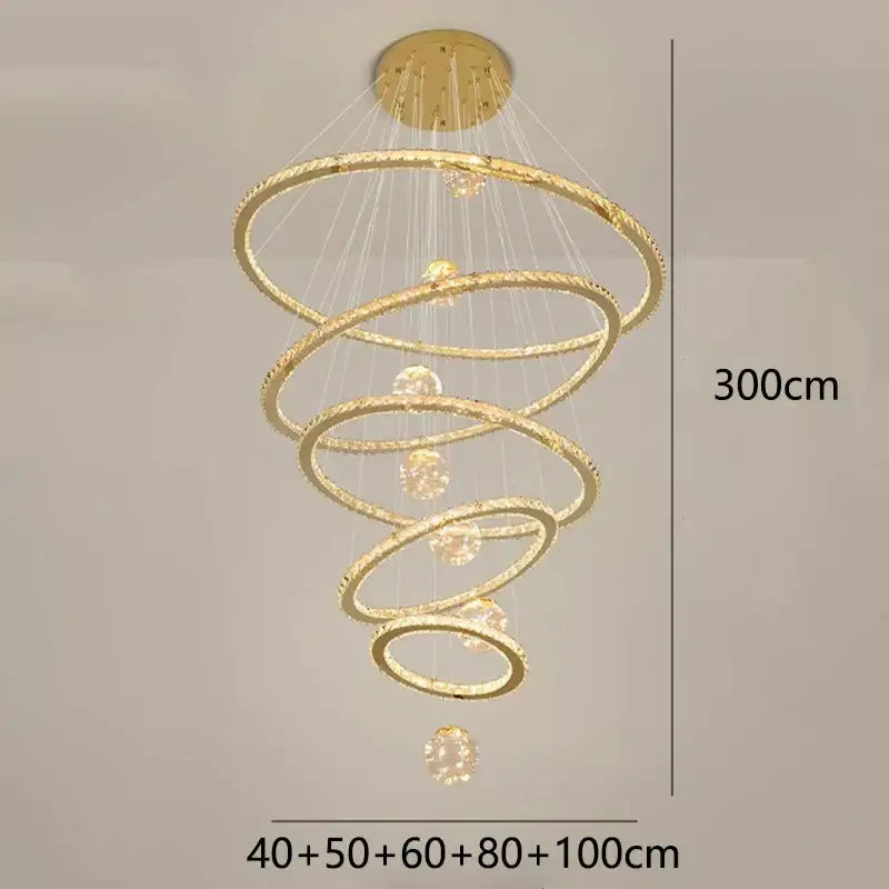 Golden spiral decorbites crystal chandelier pendant lamp with concentric rings and embedded crystals for stair lighting
