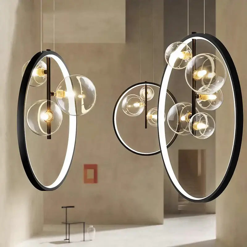 Modern black-framed pendant light with glowing rings and glass bulb clusters in decorbites crystal chandelier stair design