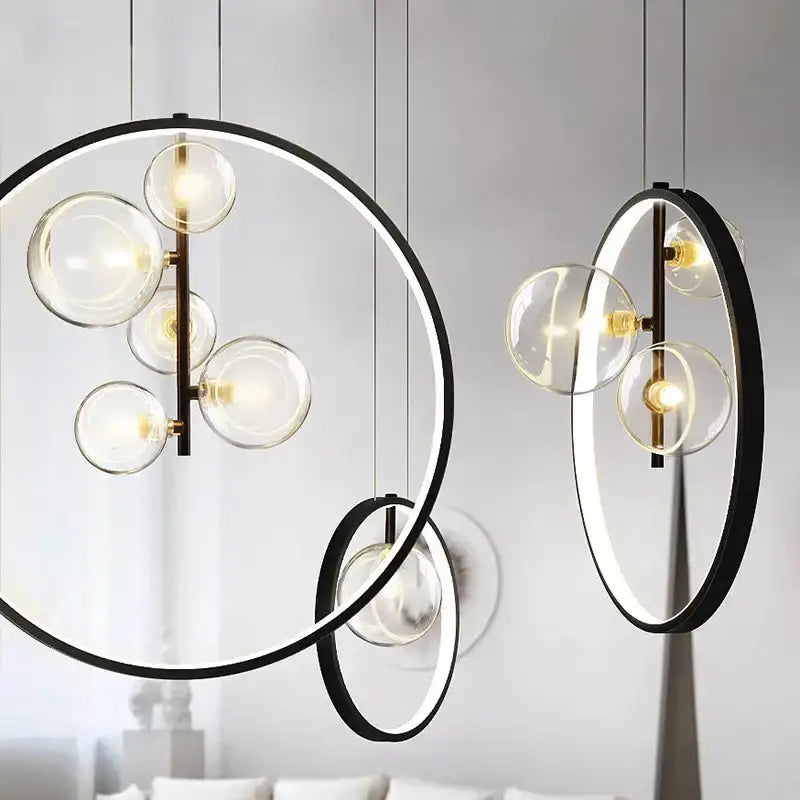 Modern black circular pendant light with clear glass globe bulbs and brass accents decorbites crystal chandelier stair lamp