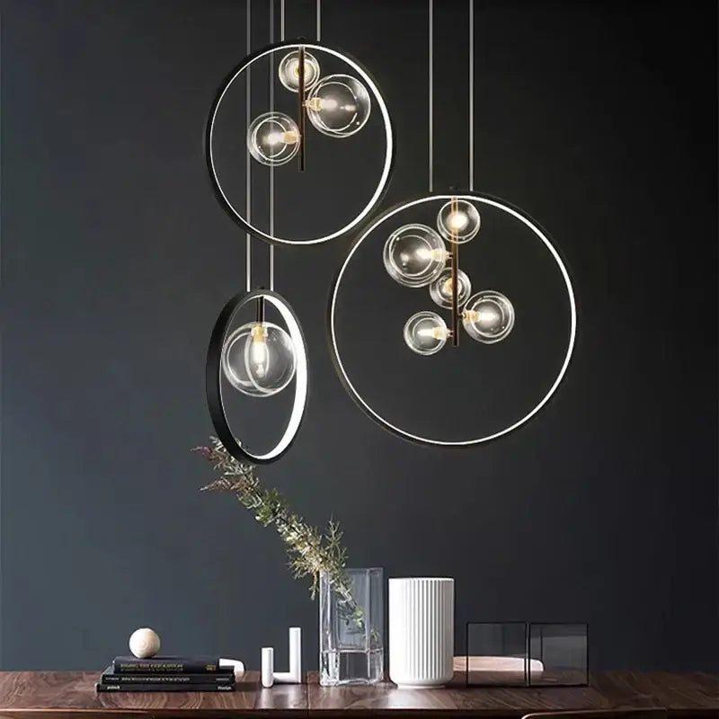 Modern pendant light with clear glass spheres and metallic frames by decorbites crystal chandelier stair above wooden table