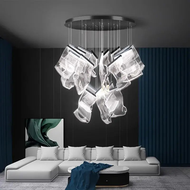 Modern decorbites crystal chandelier with translucent sculptural glass elements and metallic circular base for living room lighting