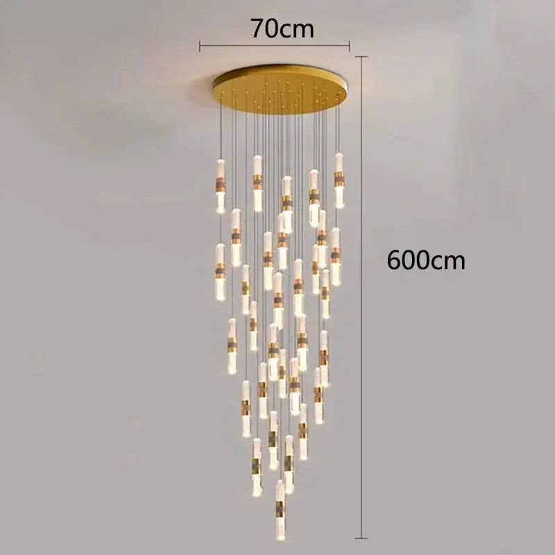 Gold-toned DecorBites crystal chandelier stair pendant lamp with cascading glass and metal accents for interior lighting