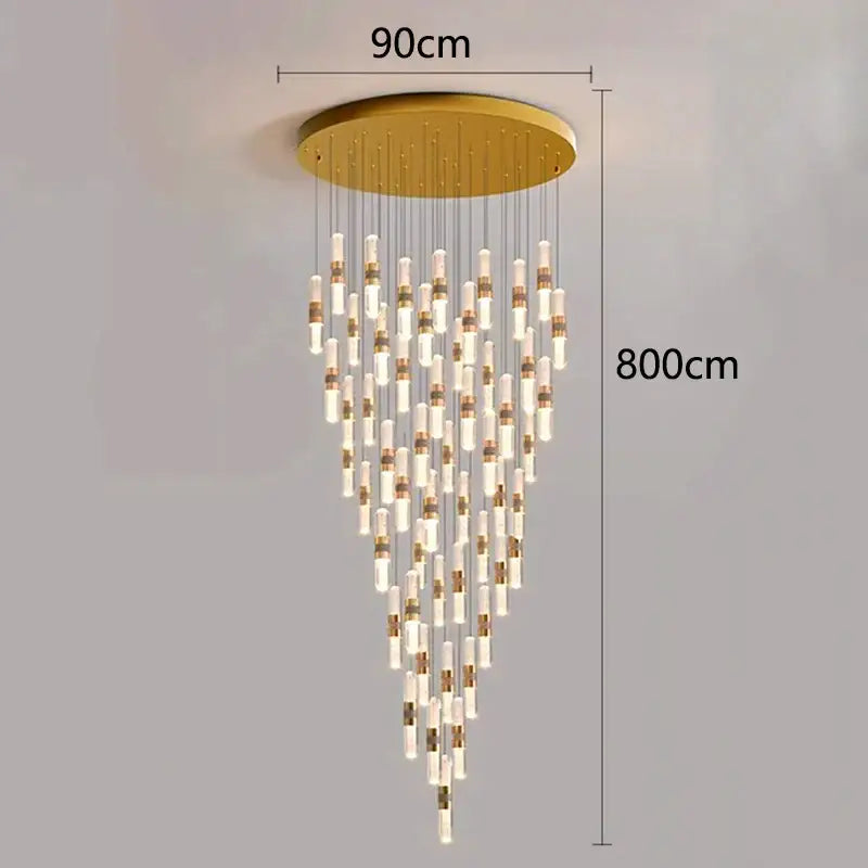 Gold-toned decorbites crystal chandelier pendant lamp with cascading clear glass tubes and brass accents for stair lighting