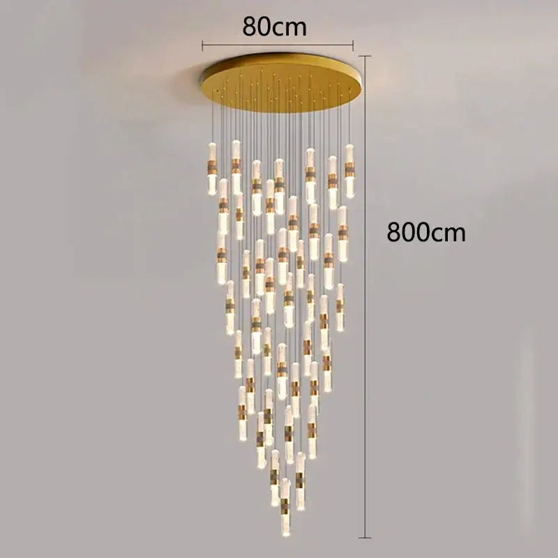 Gold-toned decorbites crystal chandelier stair pendant lamp with clear glass tubes and brass accents for interior lighting