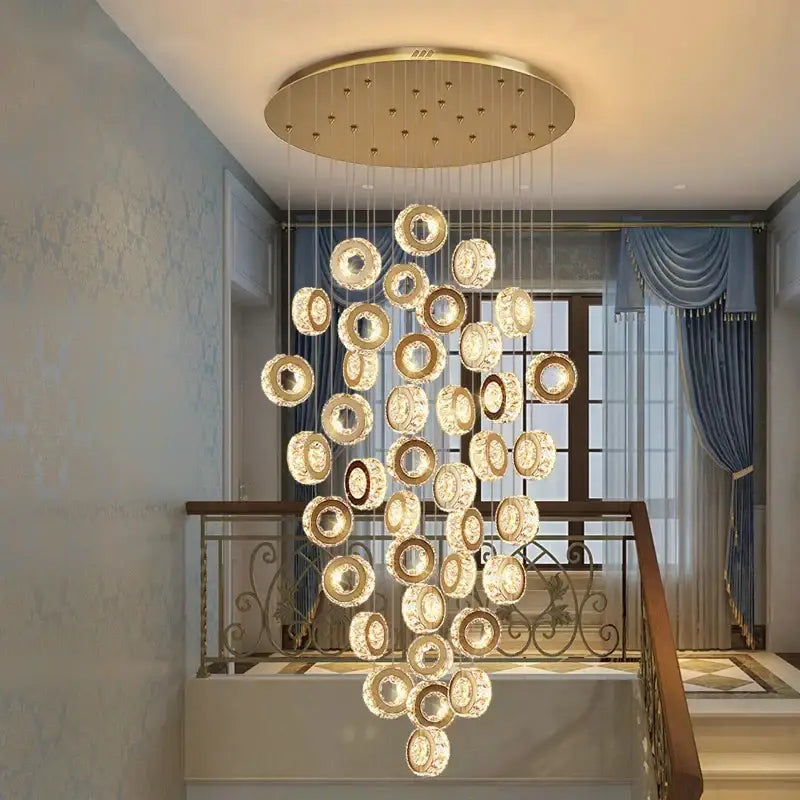 Golden circular decorbites crystal chandelier with modern cascading design pendant light for stair and living room lighting