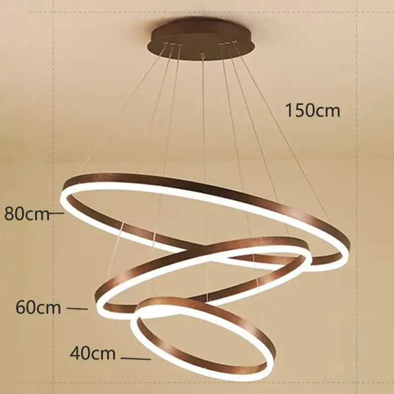 Modern bronze-finished decorbites crystal chandelier pendant lamp with three glowing interlocking rings for stair lighting