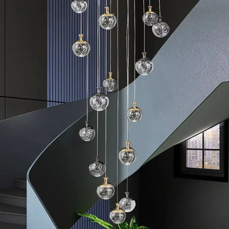 A decorbites crystal chandelier stair pendant lamp with clear crackled glass orbs and gold-toned metallic tops