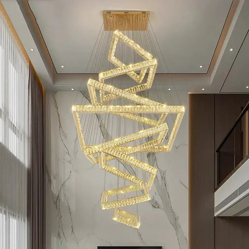 Golden crystal chandelier with modern geometric interlocking frames in decorbites crystal chandelier stair pendant lamp design