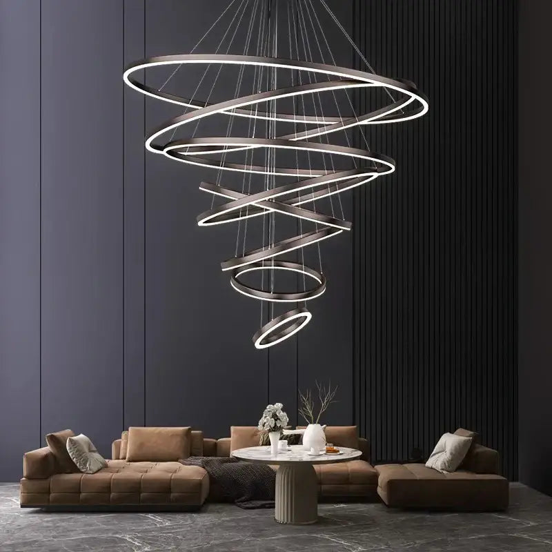 Modern spiral decorbites crystal chandelier pendant lamp with metallic finish and illuminated rings for stair lighting