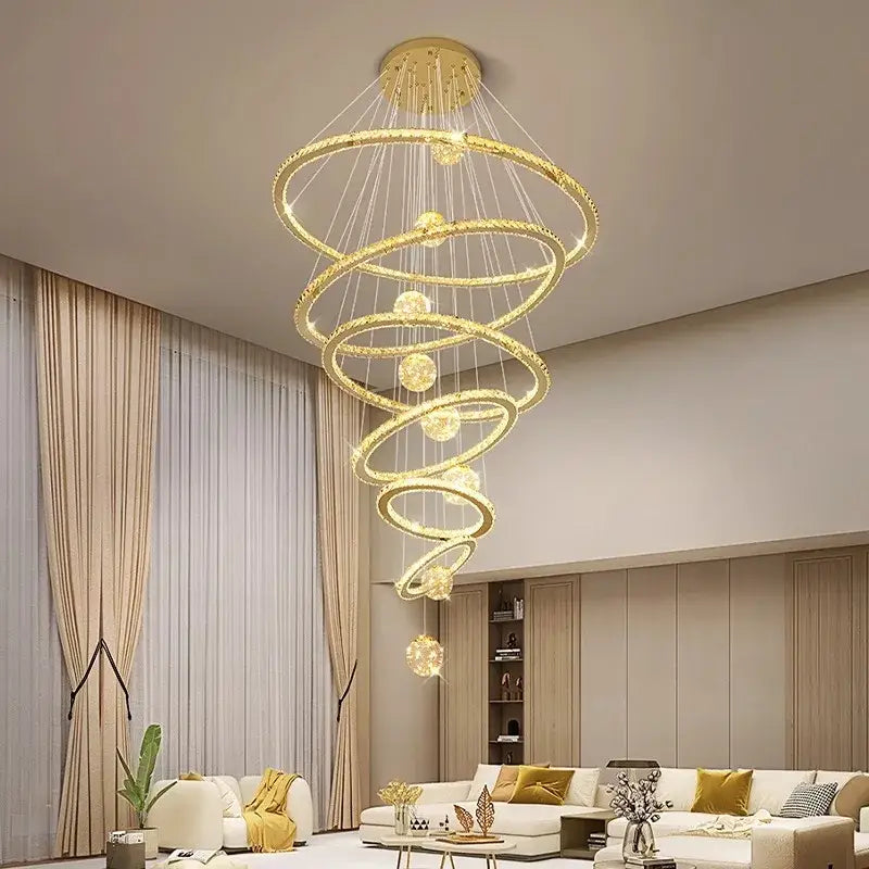 DecorBites crystal chandelier stair pendant lamp featuring golden spiral design with crystal accents and warm LED lighting