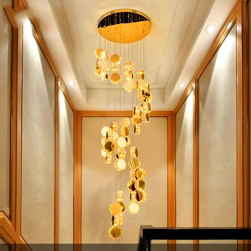 Golden decorbites crystal chandelier with cascading mirrored discs as a stair pendant lamp for interior lighting