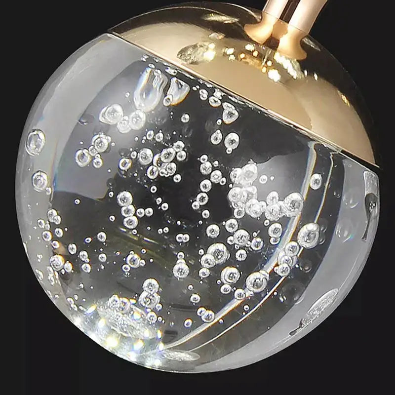 Elegant DecorBites crystal chandelier stair pendant with clear crackled glass spheres and gold-toned metal fixtures