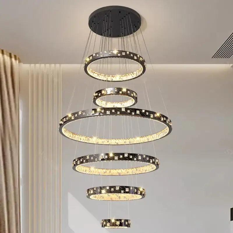 Modern black DecorBites crystal chandelier stair pendant with cascading rings and sparkling crystal accents for living rooms