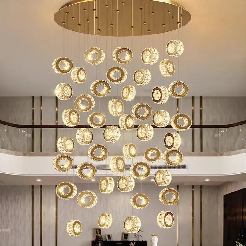 Golden circular decorbites crystal chandelier pendant light with crystal accents for stair and living room interior lighting